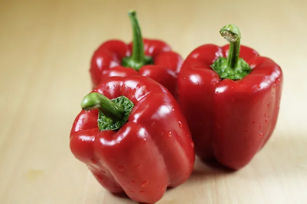 Three red peppers — Stock Photo, Image