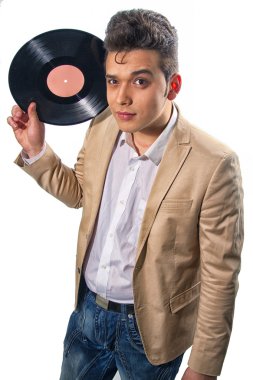 Vinyl record in the hands of a man in the style of Elvis Presley clipart