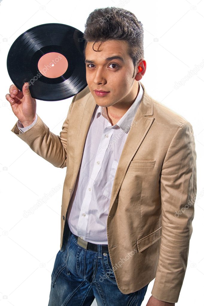 Vinyl record in the hands of a man in the style of Elvis Presley