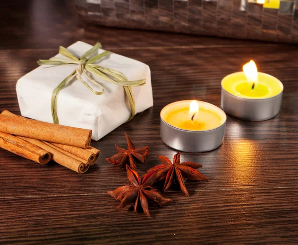 Candle, cinnamon and anise — Stock Photo, Image