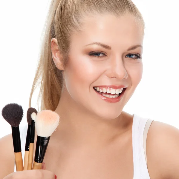 Beauty portrait with brushes — Stock Photo, Image