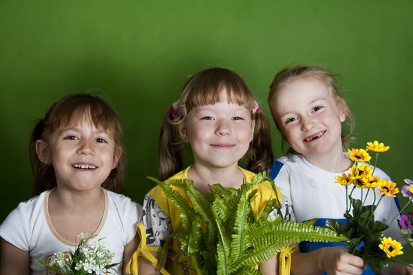 Cheerful children in a kindergarten summer. Royalty Free Stock Images