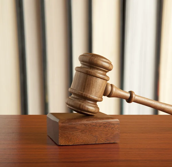 Wooden gavel and old book — Stock Photo, Image