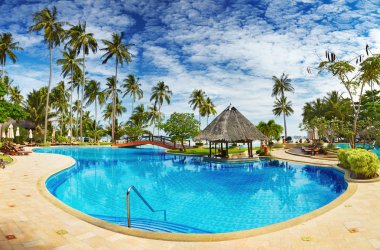 Swimming pool on the beach clipart