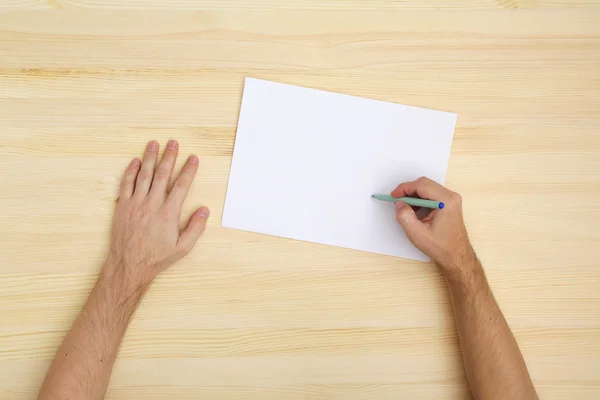 Man writing on the paper — Stock Photo, Image