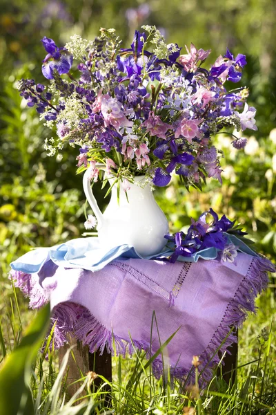 Bouquet of irises and meadow — Stock Photo, Image