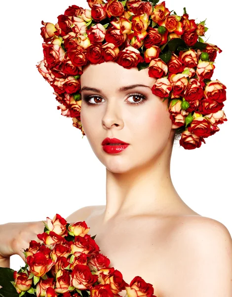 Portret van jonge mooie vrouw met roos in haar, op witte ba — Stockfoto