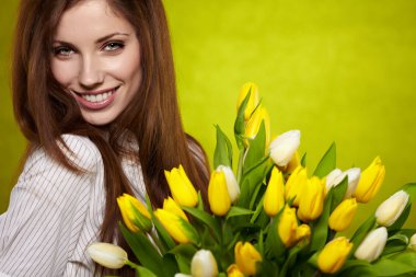 Woman with colorful tulip bouquet clipart