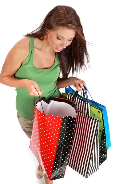 Gyönyörű, fiatal, nő, színes bevásárló táskák, a kezében — Stock Fotó