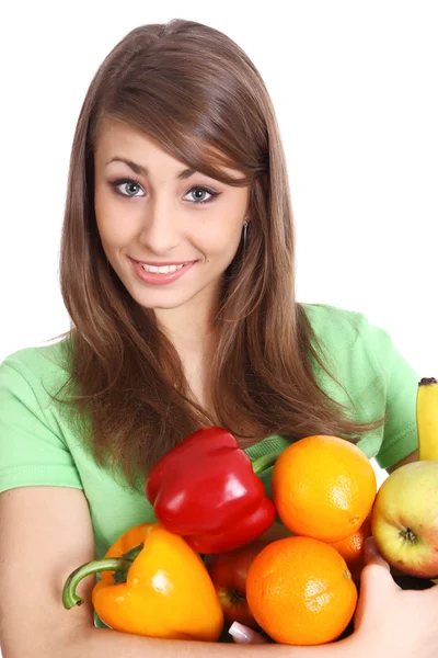 Portret van een meisje holding in handen vol met verschillende vruchten een — Stockfoto