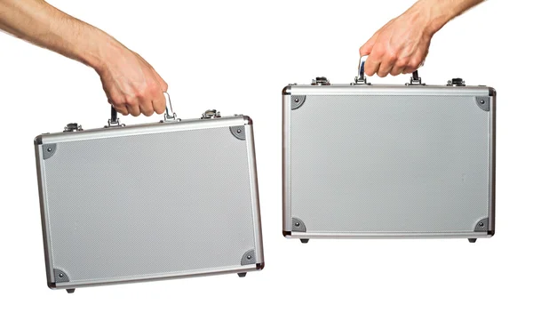 Silver metal briefcase in hands — Stock Photo, Image