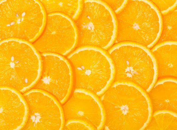 Plátky oranžové pozadí — Stock fotografie