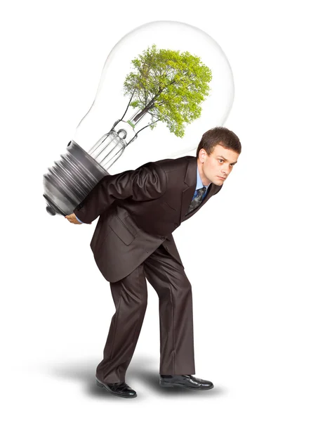Businessman with eco lamp on back — Stock Photo, Image
