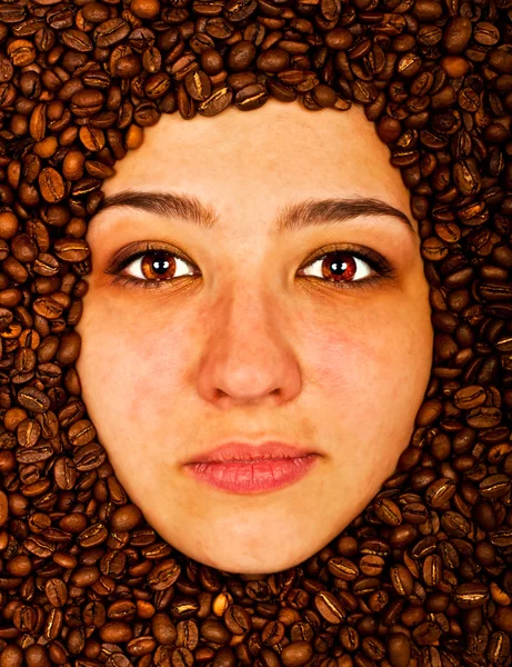 Coffee beans around of face — Stock Photo, Image