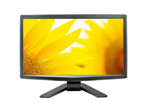 Monitor met zonnebloemen op scherm — Stockfoto