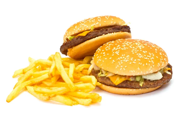 Due cheeseburger con patatine fritte — Foto Stock