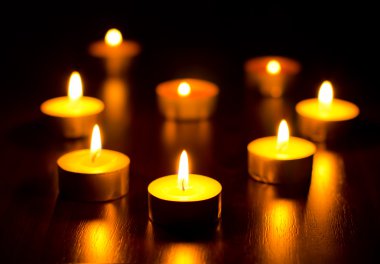 Many burning candles clipart