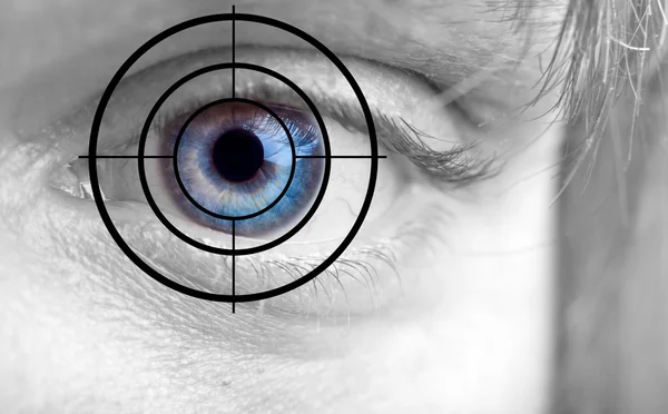 Mans blue eye and target — Stock Photo, Image