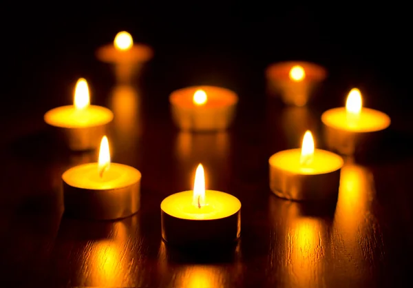 Many burning candles — Stock Photo, Image