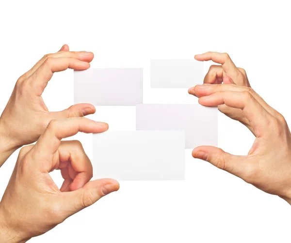 Business cards in hands — Stock Photo, Image