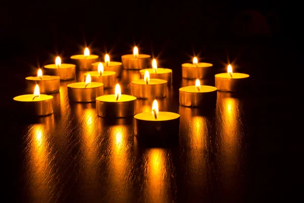 Muitas velas acesas — Fotografia de Stock