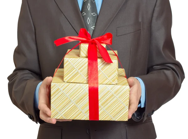 Businessman with gift Stock Image