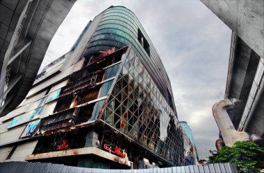 Fire damaged exterior of Central World Plaza shopping mall clipart