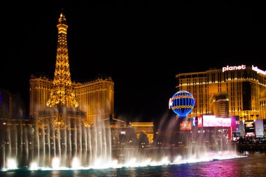 The Musical fountains on Eiffel Tower of Hotel Paris background clipart