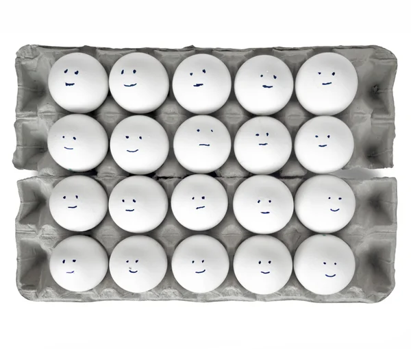 Яйца с улыбками — стоковое фото