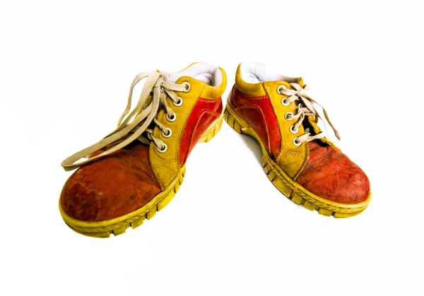 Rote schmutzige Stiefel — Stockfoto