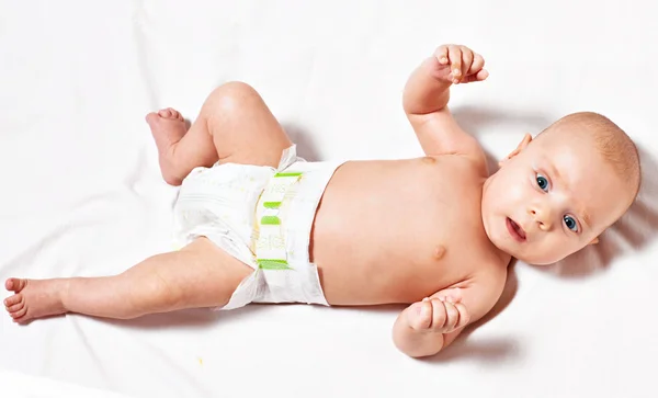 Imagem do recém-nascido descansando em uma cama — Fotografia de Stock