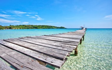 Old wooden pier in the sea clipart