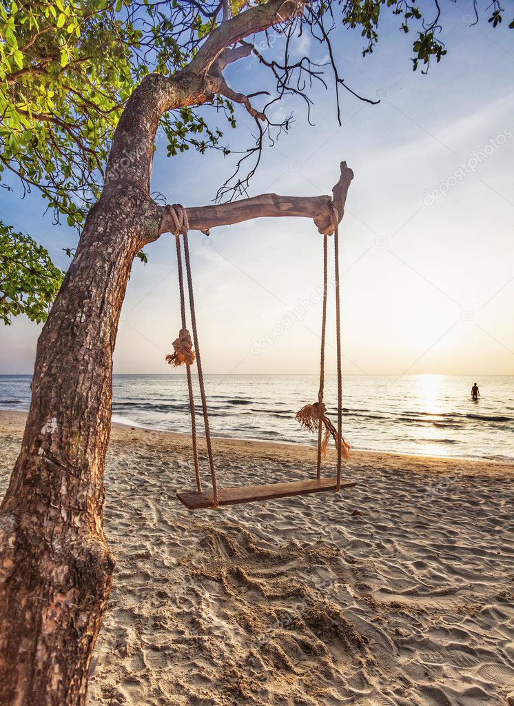 Swing on sunset at the beach