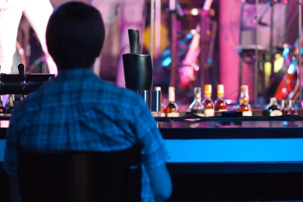 Stock image Man sitting in a bar