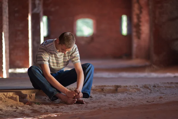 stock image Thoughtful man sitting