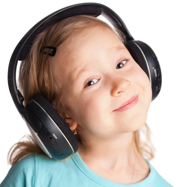 Menina em fones de ouvido — Fotografia de Stock