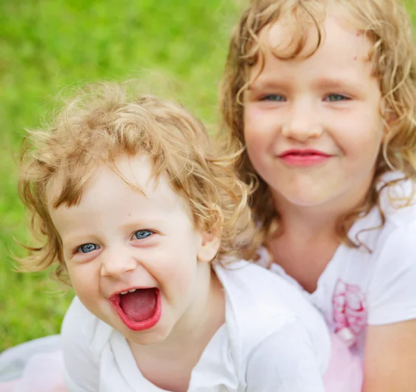 Two children in summer park Royalty Free Stock Photos