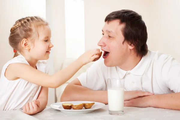 Child with father have a breakfast — Stock Photo, Image