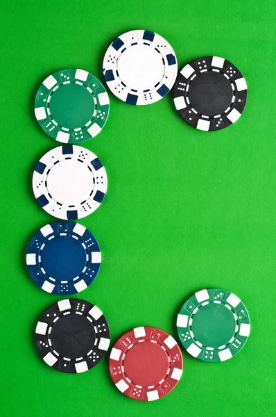 stock image Counters for game in a casino on зелоном a background