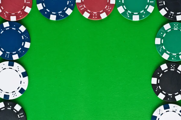 stock image Counters for game in a casino on зелоном a background