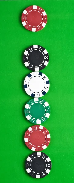 stock image Counters for game in a casino on зелоном a background