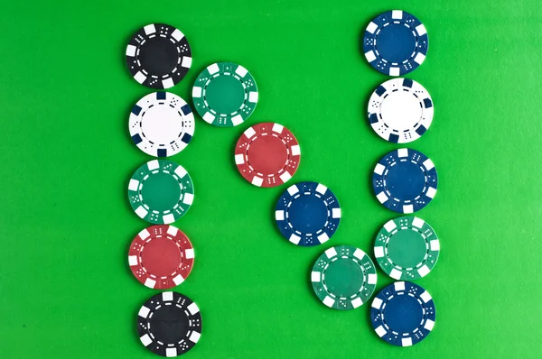 stock image Counters for game in a casino on зелоном a background