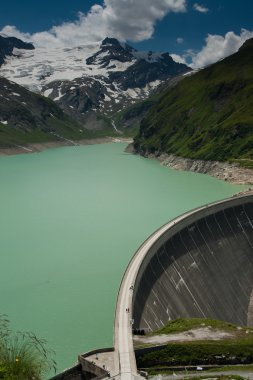 Kaprun Dam, lake and Alps clipart