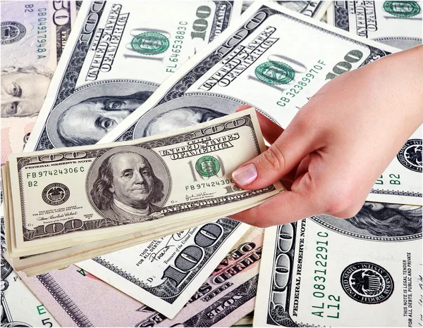 Hand and dollars — Stock Photo, Image