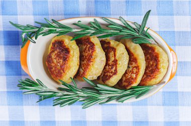 Cutlets and rosemary clipart