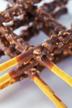 Wheat crossed sticks with chocolate clipart