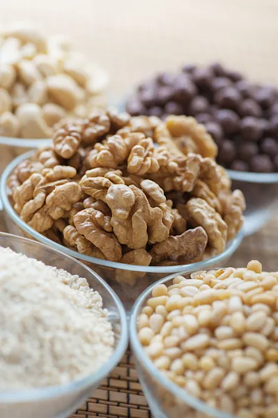 Walnuts, cashews, sesame seeds, pine nuts — Stock Photo, Image