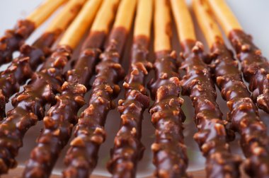 Crispy sweet straws filled chocolate clipart