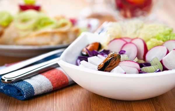 Salad with radishes and seafood — Stock Photo, Image