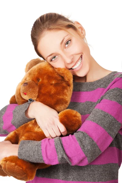 Hübsche junge Frau mit Teddybär isoliert auf dem weißen Rücken — Stockfoto